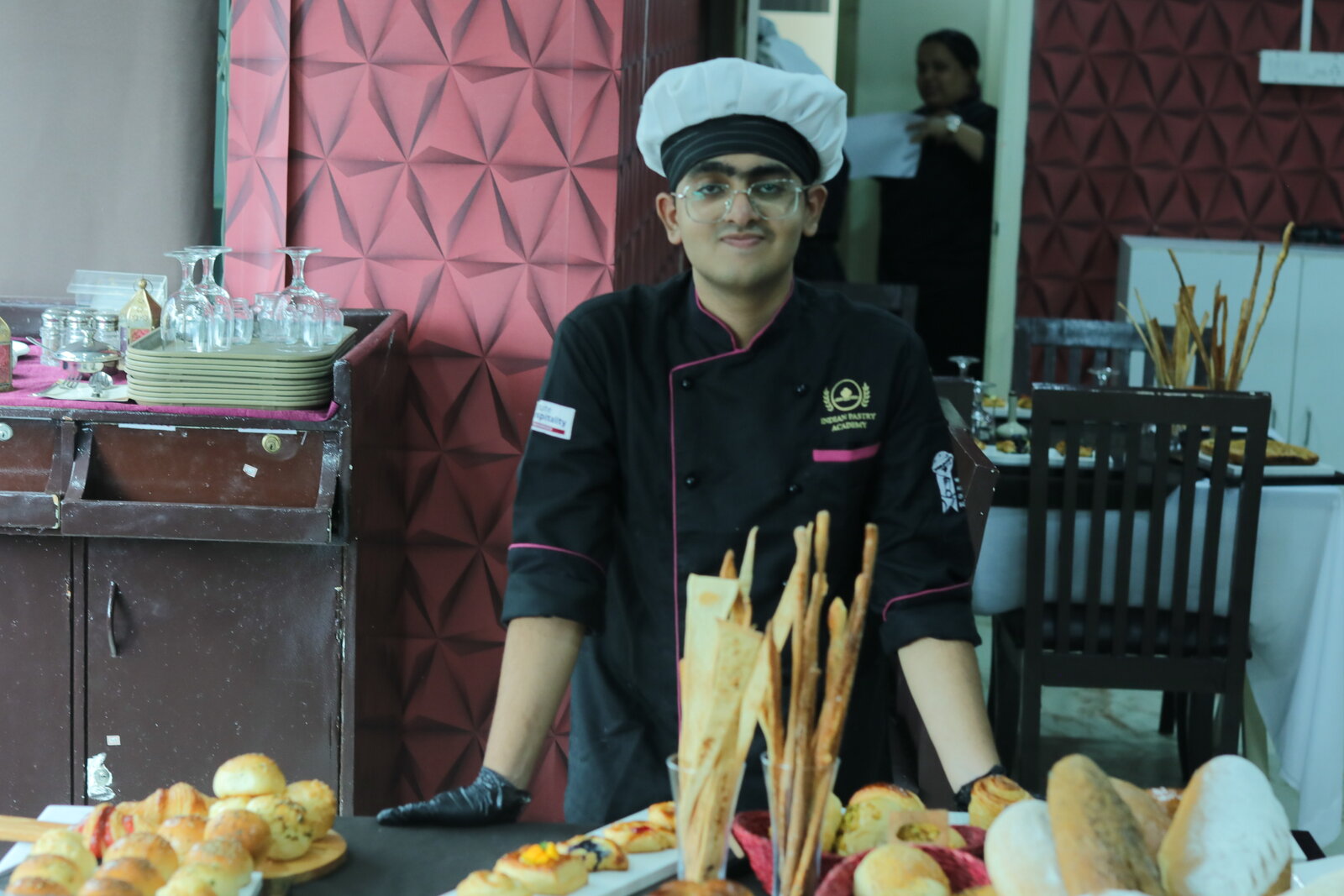 Indian Pastry Academy student presenting a bakery display for the Bakery & Pastry Arts degree course